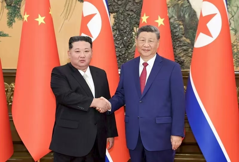 习近平同朝鲜劳动党总书记、国务委员长金正恩举行会谈